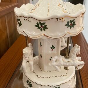 Festive musical carousel with Holly Design